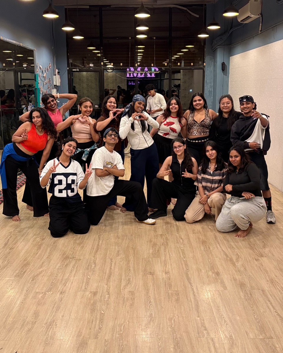 Students posing together after class at the iMAP studio